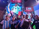 Kolkata: Argentina fans celebrate after Lionel Messi scores a goal at the FIFA World Cup 2022 final match. 