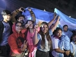 A group of Argentina football fans in Kolkata celebrate their team's 2022 FIFA World Cup victory.(PTI)