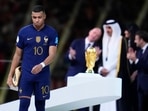 France's Kylian Mbappe walks with the Golden Boot award France's Kylian Mbappe walks with the Golden Boot award