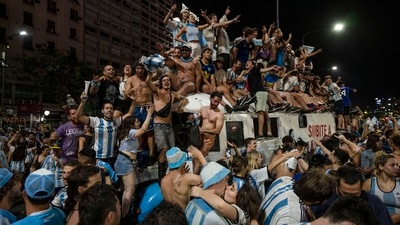 Soccer fans celebrate Argentina's victory over France in the World Cup final soccer match, in Buenos Aires, Argentina, on Sunday. "This is happiness for everyone, for all these people. Today it was our turn and the joy is ours," hotel receptionist Julio Berdun told AFP at the capital's Plaza de Mayo square. (AP) Soccer fans celebrate Argentina's victory over France in the World Cup final soccer match, in Buenos Aires, Argentina, on Sunday. "This is happiness for everyone, for all these people. Today it was our turn and the joy is ours," hotel receptionist Julio Berdun told AFP at the capital's Plaza de Mayo square. (AP)