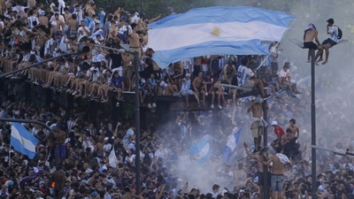 At the end of the first half, many were gearing up to celebrate as Argentina led 2-0 and clearly dominated the match. But that early happiness turned to anxiety as France caught up, ultimately leaving the score at 3-3 before Argentina beat France 4-2 on penalties. For many, the agonizing feelings of the match made the victory all the sweeter. (Matilde Campodonico / AP) At the end of the first half, many were gearing up to celebrate as Argentina led 2-0 and clearly dominated the match. But that early happiness turned to anxiety as France caught up, ultimately leaving the score at 3-3 before Argentina beat France 4-2 on penalties. For many, the agonizing feelings of the match made the victory all the sweeter. (Matilde Campodonico / AP)