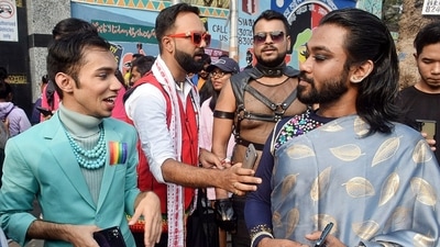 Participants of the pride walk interacting with each other. (ANI) Participants of the pride walk interacting with each other. (ANI)