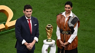 Former Spanish footballer and World Cup winner Iker Casillas and actor Deepika Padukone stand next to the World Cup Trophy before the start of the Qatar 2022 World Cup final on Sunday. (Photo by Jewel SAMAD / AFP) (AFP) Former Spanish footballer and World Cup winner Iker Casillas and actor Deepika Padukone stand next to the World Cup Trophy before the start of the Qatar 2022 World Cup final on Sunday. (Photo by Jewel SAMAD / AFP) (AFP)