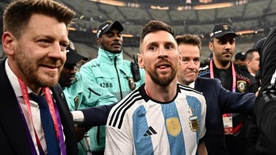 Argentina's captain and forward 10 Lionel Messi (C) reacts following the trophy ceremony after Argentina won the Qatar 2022 World Cup final football match between Argentina and France at Lusail Stadium Argentina's captain and forward 10 Lionel Messi (C) reacts following the trophy ceremony after Argentina won the Qatar 2022 World Cup final football match between Argentina and France at Lusail Stadium