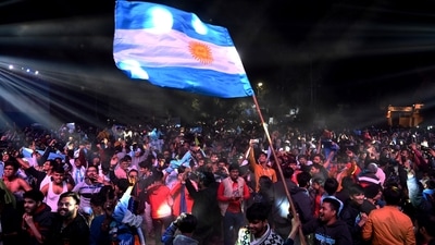 Argentina fans in Kolkata celebrate the team's victory in the 2022 FIFA World Cup final against France. (PTI) Argentina fans in Kolkata celebrate the team's victory in the 2022 FIFA World Cup final against France. (PTI)