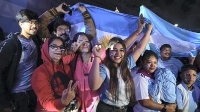 A group of Argentina football fans in Kolkata celebrate their team's 2022 FIFA World Cup victory. (PTI) A group of Argentina football fans in Kolkata celebrate their team's 2022 FIFA World Cup victory. (PTI)