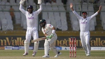 England appeal successfully for a caught behind against Mohammad Rizwan (AP)