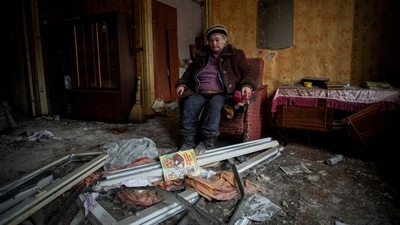A local resident Natalia, 67, sits inside her house destroyed by a Russian military strike, as Russia's attack on Ukraine continues, in Kramatorsk, Ukraine December 17. (REUTERS)