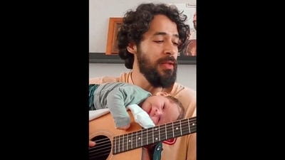 The father is singing lullaby to his son. (Instagram/@ValaAfshar) The father is singing lullaby to his son. (Instagram/@ValaAfshar)