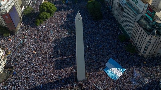 In this aerial view fans of Argentina celebrate winning the Qatar 2022 World Cup against France at the Obelisk in Buenos Aires, on December 18, 2022. (AFP) In this aerial view fans of Argentina celebrate winning the Qatar 2022 World Cup against France at the Obelisk in Buenos Aires, on December 18, 2022. (AFP)