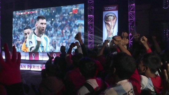 Argentina supporters in Kolkata celebrate after the FIFA World Cup final win against France. (AP)
