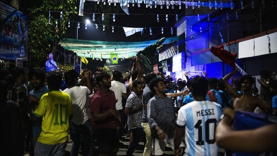 Argentina fans in Kerala's Kochi celebrate their team's victory.(AP)