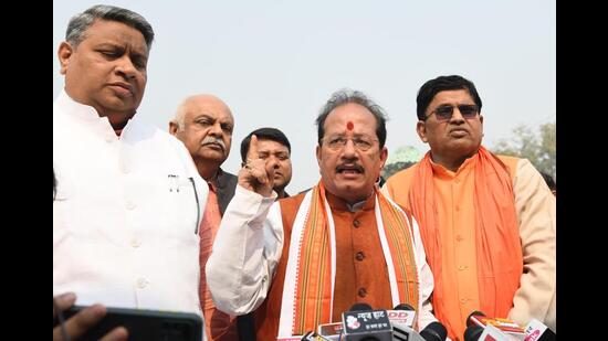 Leader of Opposition Vijay Kumar Sinha with BJP legislators outside of Bihar Assembly in Patna on Monday. (Santosh Kumar/HT Photo)