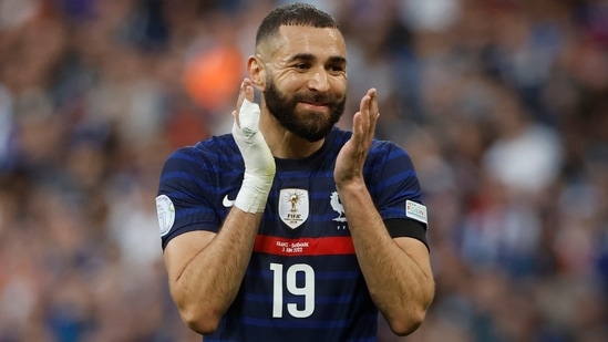 Karim Benzema, right, reacts during the UEFA Nations League match between France and Denmark (AP)