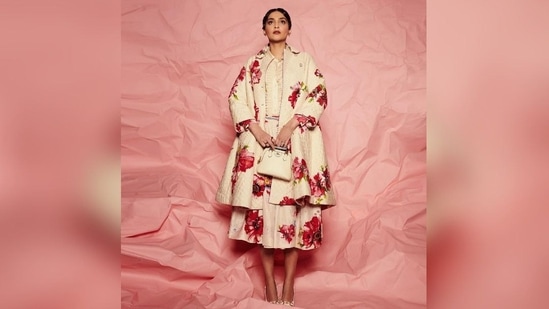 Assisted by her designer sister Rhea Kapoor and fashion stylist Manisha Melwani, Sonam kept her accessories minimal and elegant, including a small handbag, stacked rings, stoned studs and white stilettoes. (Instagram/@sonamkapoor)