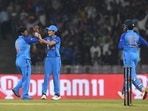 India's Deepti Sharma (L) and Renuka Singh Thakur celebrate after the dismissal of Australia's Alyssa Healy (not pictured) during the second women�s Twenty20 international cricket match between India and Australia at the DY Patil stadium in Navi Mumbai on December 11, 2022. (Photo by INDRANIL MUKHERJEE / AFP) / ----IMAGE RESTRICTED TO EDITORIAL USE - STRICTLY NO COMMERCIAL USE-----(AFP) India's Deepti Sharma (L) and Renuka Singh Thakur celebrate after the dismissal of Australia's Alyssa Healy (not pictured) during the second women�s Twenty20 international cricket match between India and Australia at the DY Patil stadium in Navi Mumbai on December 11, 2022. (Photo by INDRANIL MUKHERJEE / AFP) / ----IMAGE RESTRICTED TO EDITORIAL USE - STRICTLY NO COMMERCIAL USE-----(AFP)
