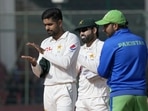 Pakistan's skipper Babar Azam, left,, Mohammad Rizwan, center, and Sarfraz Ahmed, clap for teammate Azhar Ali, who played his last match (AP) Pakistan's skipper Babar Azam, left,, Mohammad Rizwan, center, and Sarfraz Ahmed, clap for teammate Azhar Ali, who played his last match (AP)