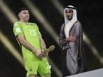 Argentina's goalkeeper Emiliano Martinez gestures after receiving the the Golden Glove award for the best goalkeeper after the FIFA World Cup final. Argentina's goalkeeper Emiliano Martinez gestures after receiving the the Golden Glove award for the best goalkeeper after the FIFA World Cup final.