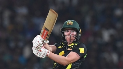 Australia's Tahlia McGrath plays a shot during the second women's Twenty20 international cricket match between India and Australia at the DY Patil stadium in Navi Mumbai on December 11, 2022. (Photo by INDRANIL MUKHERJEE / AFP) / ----IMAGE RESTRICTED TO EDITORIAL USE - STRICTLY NO COMMERCIAL USE----- (AFP) Australia's Tahlia McGrath plays a shot during the second women's Twenty20 international cricket match between India and Australia at the DY Patil stadium in Navi Mumbai on December 11, 2022. (Photo by INDRANIL MUKHERJEE / AFP) / ----IMAGE RESTRICTED TO EDITORIAL USE - STRICTLY NO COMMERCIAL USE----- (AFP)