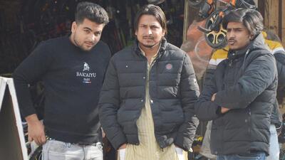 Imran (centre) outside the police station at Raj Nagar extension police chowki in Ghaziabad on Tuesday. (Sakib Ali/HT Photo)