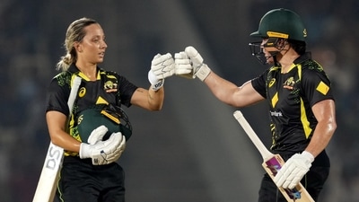 Grace Harris and Ashleigh Gardner return to the pavilion after the first inning during the 5th T20I (PTI) Grace Harris and Ashleigh Gardner return to the pavilion after the first inning during the 5th T20I (PTI)
