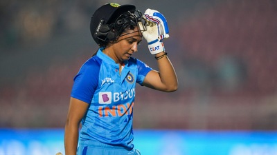 Harmanpreet Kaur returns back to the pavilion after getting out during the 5th T20I (PTI) Harmanpreet Kaur returns back to the pavilion after getting out during the 5th T20I (PTI)