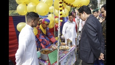 Vice chancellor of LU, Alok Kumar Rai, tastes Rajasthani items at the food festival organised by the 64th UP Battalion, NCC at Lucknow University (HT photo) Vice chancellor of LU, Alok Kumar Rai, tastes Rajasthani items at the food festival organised by the 64th UP Battalion, NCC at Lucknow University (HT photo)