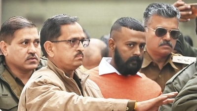 Sukesh Chandrasekhar appears before Delhi court in connection with a money laundering case on Tuesday. (Vipin Kumar/HT photo) Sukesh Chandrasekhar appears before Delhi court in connection with a money laundering case on Tuesday. (Vipin Kumar/HT photo)