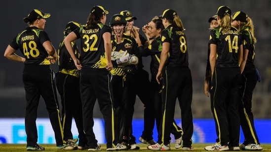 Australia players celebrate after the dismissal of Renuka Singh (not pictured) during the 5th T20I(AFP)