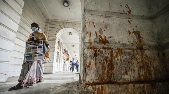 New Delhi, India - Dec. 20, 2022: paan-stained walls in Connaught Place. Though the dirty white pillars of the colonial-era arcade in New Delhi, India, on Tuesday, December 20, 2022. (Photo by Raj K Raj/ Hindustan Times) to go with Paras' Story (Hindustan Times) New Delhi, India - Dec. 20, 2022: paan-stained walls in Connaught Place. Though the dirty white pillars of the colonial-era arcade in New Delhi, India, on Tuesday, December 20, 2022. (Photo by Raj K Raj/ Hindustan Times) to go with Paras' Story (Hindustan Times)