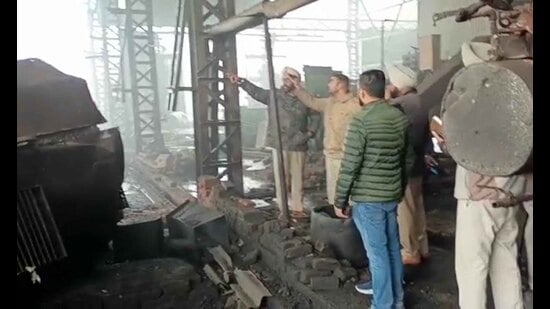 Police officials investigating at the spot after blast in the steel factory in Doraha in Ludhiana on Tuesday (Photo Hindustan Times)