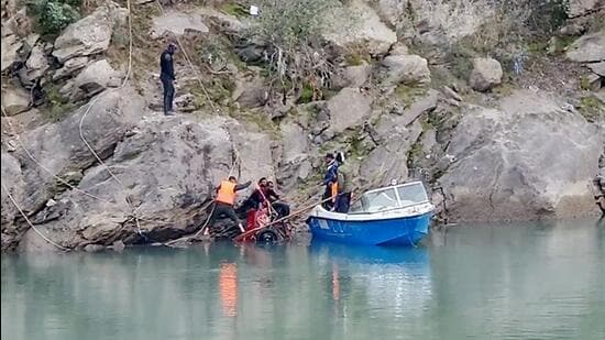 Search operation underway after a car skidded off the road and fell into the Chenab river in Doda district of Jammu and Kashmir, on Tuesday. Three members of a family are feared drowned. (ANI)