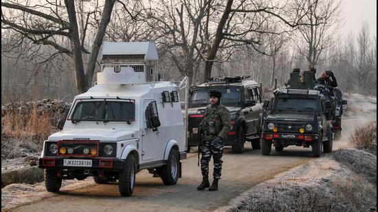 Security forces at the encounter site in Shopian on Tuesday (PTI)