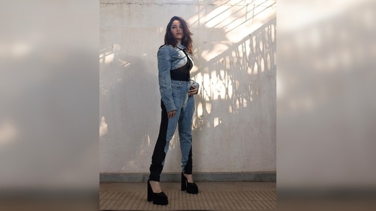 Tamannaah Bhatia's outift comes with a top attached with a cropped denim shrug and multi-material pants. (Instagram/@tamannaahspeaks)
