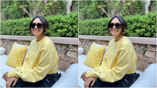 Mrunal shared her sunshine state of mind with a sun emoticon in the caption. In golden hoop earrings, tinted shades and white and blue shoes, she further accessorised her look for the day. (Instagram/@mrunalthakur)