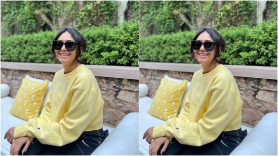 Mrunal shared her sunshine state of mind with a sun emoticon in the caption. In golden hoop earrings, tinted shades and white and blue shoes, she further accessorised her look for the day.&nbsp;(Instagram/@mrunalthakur)