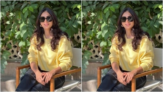 Mrunal wore her tresses open in wavy curls with a middle part as she posed for the pictures.&nbsp;(Instagram/@mrunalthakur)