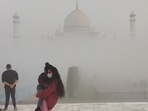 Tourists at the Taj Mahal on a foggy, winter day, in Agra on December 19. Typically, northwest India sees 2-3 moderate to strong western disturbances in November and 2-3 in December. This year it saw none since November 10, a situation that hasn’t changed thus far in December, HT reported.(ANI )