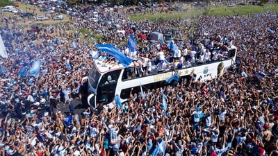 The Argentine soccer team that won the World Cup title ride on an open bus during their homecoming parade in Buenos Aires, Argentina, Tuesday, Dec. 20, 2022. AP/PTI(AP12_21_2022_000005A) (AP) The Argentine soccer team that won the World Cup title ride on an open bus during their homecoming parade in Buenos Aires, Argentina, Tuesday, Dec. 20, 2022. AP/PTI(AP12_21_2022_000005A) (AP)