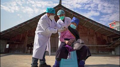 An elderly woman receives a Covid-19 vaccine in Danzhai, in China's southwestern Guizhou province. (AFP) An elderly woman receives a Covid-19 vaccine in Danzhai, in China's southwestern Guizhou province. (AFP)
