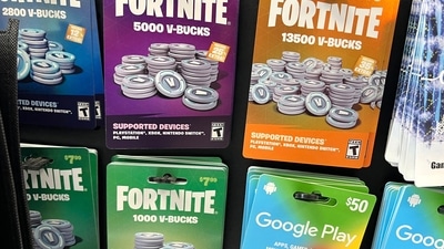 Fortnite V-Bucks are offered for sale at a video game retailer in Chicago, Illinois. Epic Games, the maker of Fortnite, has been ordered by the Federal Trade Commission to pay $520 million to settle allegations that it collected personal data from children without the the consent of a parent or guardian. (AFP)