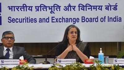 SEBI chairperson Madhabi Puri Buch with Whole Time Members (WTM) Ananta Barua (left) and Ashwani Bhatia during a press conference, at SEBI head office in Mumbai, Tuesday. (PTI)