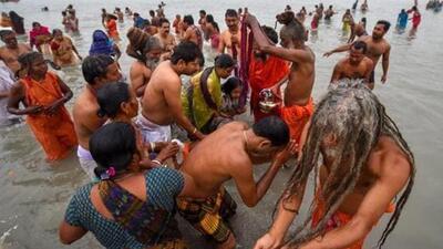Pilgrims take a dip at Sagar Island, (PTI Photo) Pilgrims take a dip at Sagar Island, (PTI Photo)