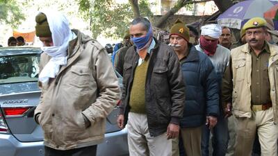 The convicted police officers leave CBI court after their sentencing in Ghaziabad on Wednesday. (Sakib Ali/HT Photo) The convicted police officers leave CBI court after their sentencing in Ghaziabad on Wednesday. (Sakib Ali/HT Photo)