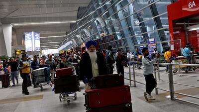 Travellers at the departure area of Indira Gandhi International Airport in New Delhi. (Reuters) Travellers at the departure area of Indira Gandhi International Airport in New Delhi. (Reuters)