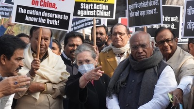 Congress MPs Mallikarjun Kharge, Sonia Gandhi, P Chidambaram, KC Venugopal, DMK's TR Baalu and other members stage a protest near the Gandhi Statue demanding discussion on national security and Indo-China border dispute issue during the Winter session of Parliament, in New Delhi, Wednesday, December 21, 2022. (PTI Photo/Manvender Vashist Lav) Congress MPs Mallikarjun Kharge, Sonia Gandhi, P Chidambaram, KC Venugopal, DMK's TR Baalu and other members stage a protest near the Gandhi Statue demanding discussion on national security and Indo-China border dispute issue during the Winter session of Parliament, in New Delhi, Wednesday, December 21, 2022. (PTI Photo/Manvender Vashist Lav)
