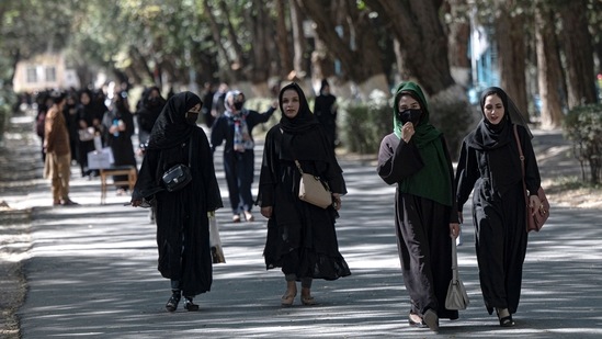 In this file photo from October 13, female Afghan students arrive for entrance exams at Kabul University in Kabul. UN experts said last month that the Taliban's treatment of women and girls in Afghanistan may amount to a crime against humanity, AP reported.(Wakil Kohsar / AFP)