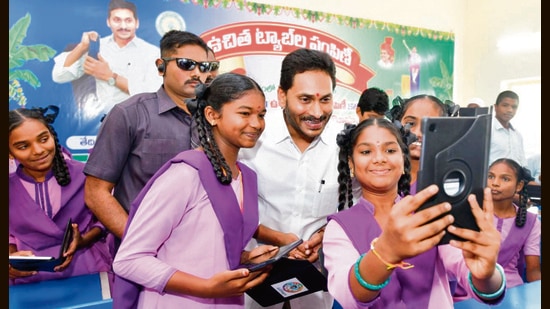 Addressing a gathering, Jagan said his government was distributing 5,18,740 tabs to 4,59,564 Class 8 students and 59,176 teachers across the state Addressing a gathering, Jagan said his government was distributing 5,18,740 tabs to 4,59,564 Class 8 students and 59,176 teachers across the state
