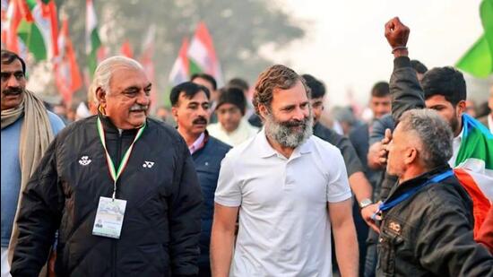 Gurugram, India-December 21: Congress leader Rahul Gandhi and Former Haryana CM Bhupinder Singh Hooda during the Bharat Jodo Yatra at Ferozepur Jhirka in Mewat, in Gurugram, India, on Wednesday, 21 December 2022. (Photo by Hindustan Times)(Pic to go with Abhishek Behl's story)