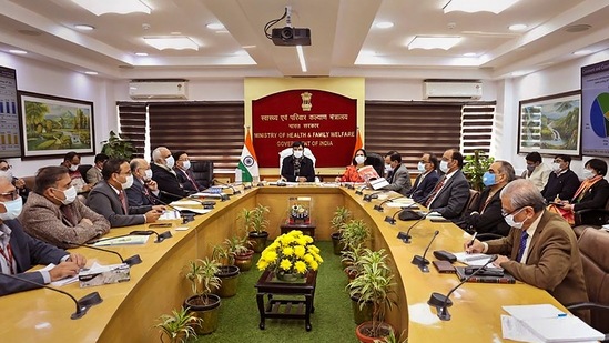  Union minister for health and family welfare Mansukh Mandaviya chairs a meeting with senior officials and experts on the COVID-19 situation, in Delhi, Wednesday.(PTI)